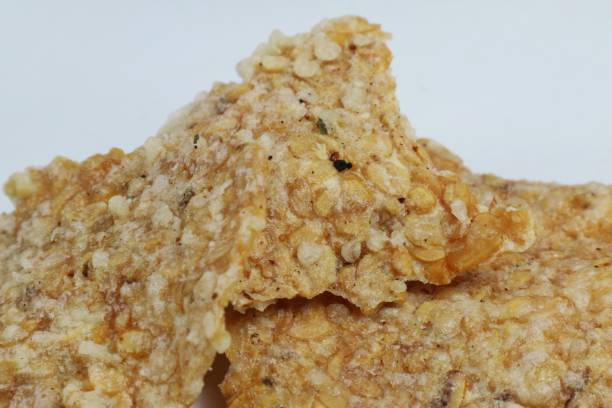 istock close up of tempeh chips isolated on white 2192758862