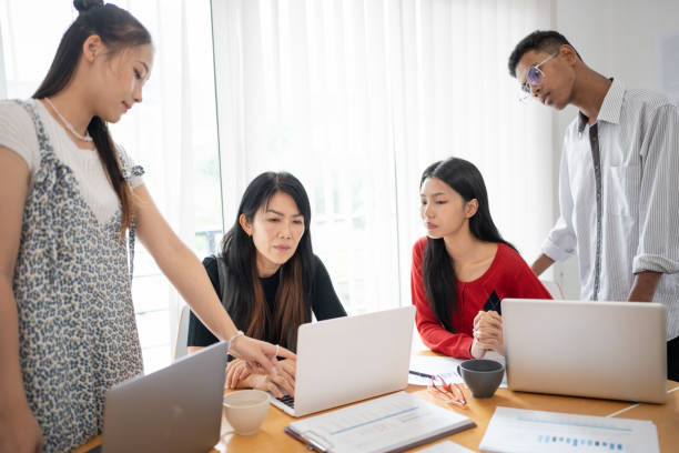 istock Business people group diverse colleagues team discuss project in  bright modern office Startup Diversity Teamwork Brainstorming. 2192759455