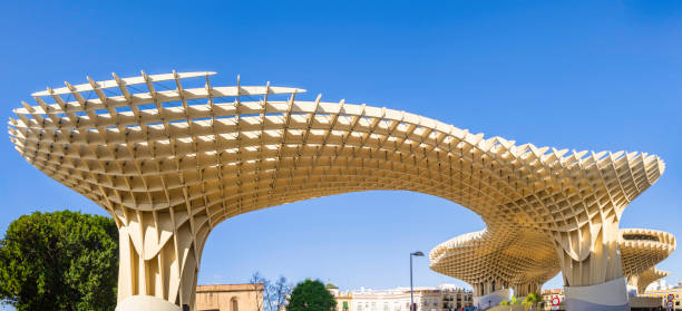 The famous Setas de Sevilla (Mushrooms of Seville), initially titled Metropol Parasol, the large structure located at La Encarnación square, whose panoramic terrace allows view of Seville's old city (4 shots stitched)