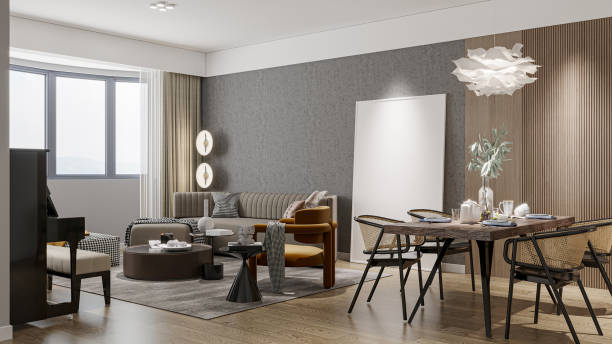 istock A blank mockup frame is hung on a grey wall in a small open-layout apartment living room 2192761653