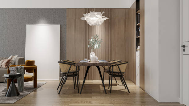 istock A minimalist dining room features an elegant chandelier hanging above the table. 2192761656