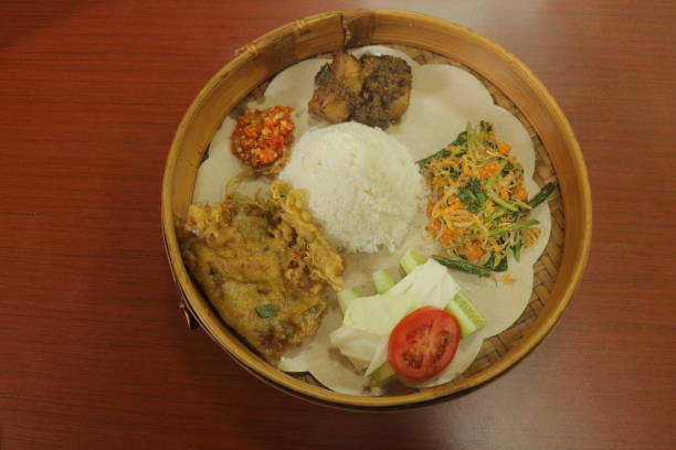 istock Traditional Indonesian Meal in Bamboo Basket 2192762282