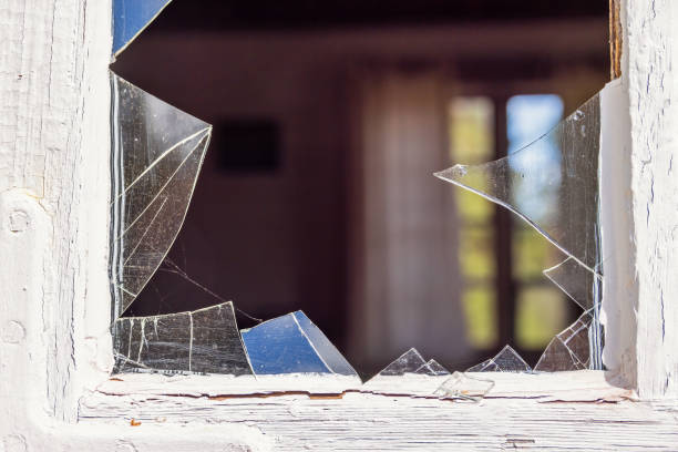istock Glass shard in broken window on a window 2192765530