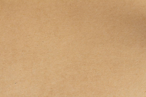 istock Cardboard sheet texture background, pattern of brown kraft paper with vintage style. 2192765702