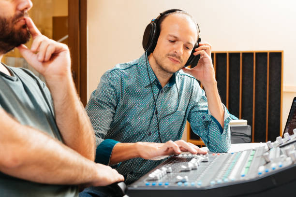 istock Musician Working on Mixing Table in Recording Studio During Sound Engineering Session 2192765726