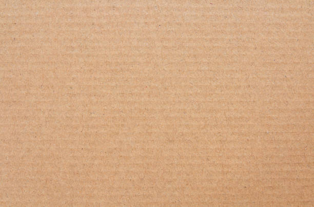 istock Cardboard sheet texture background, detail of recycle brown paper box pattern. 2192765735