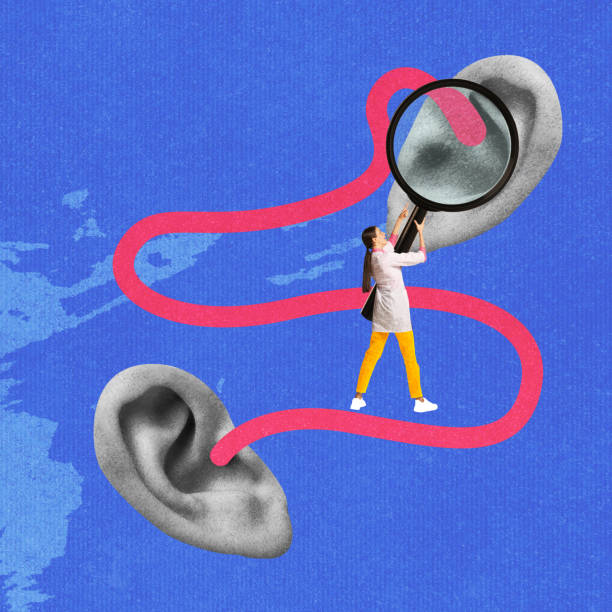 istock Human ears connected by bold pink line, with woman checking with magnifying glass symbolizing hearing tests and auditory health. Contemporary art collage. 2192767565