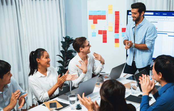 istock Happy office worker achieving business task on time and on schedule. Prudent 2192772276