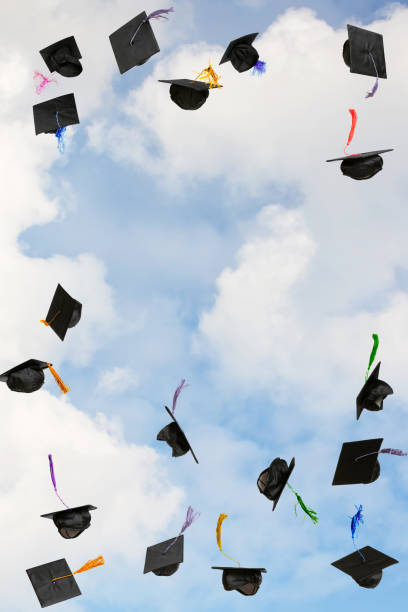 istock Graduation caps thrown in the sky 2192772843