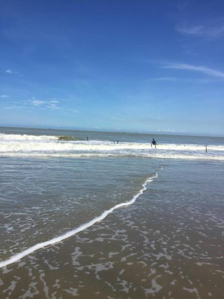 istock Serene Beach Scene with Gentle Surf and Open Horizon 2192773947