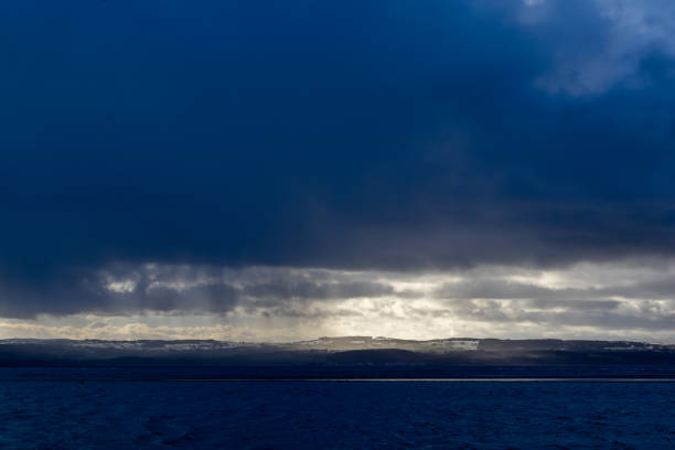 istock Dramatic clouds over Dee Estuary and North Wales coastline, Wirral, Merseyside, England, Britain 2192777313