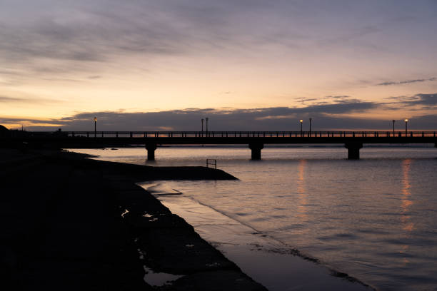 istock A bridge over the coast and a beautiful sunrise 2192777668