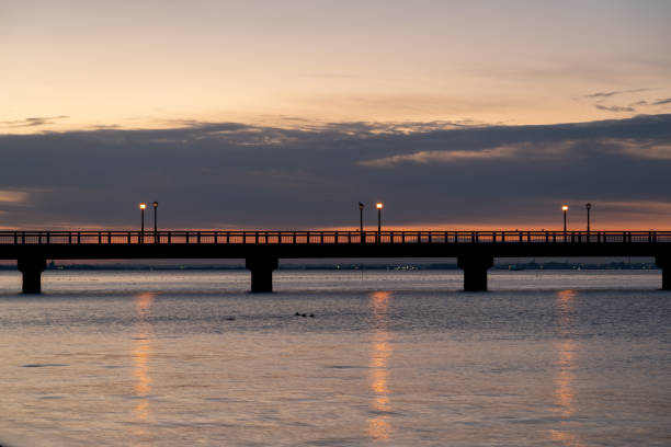 istock A bridge over the coast and a beautiful sunrise 2192777687
