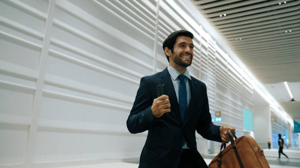 istock Happy business man celebrate his successful project while walking. Exultant. 2192777830