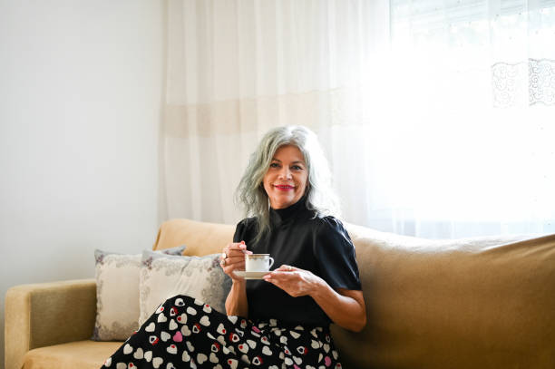 istock senior woman drinking tea. 2192778346