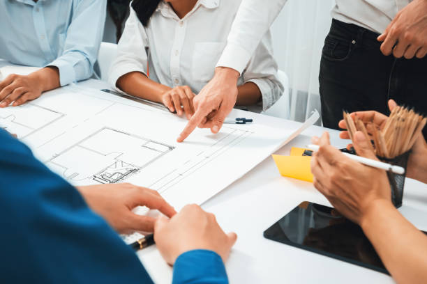 istock Diverse group of civil engineer and client working on architect. Prudent 2192778438