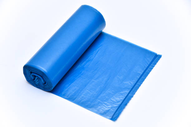 istock Roll of blue garbage bag top view isolated on white background 2192778572
