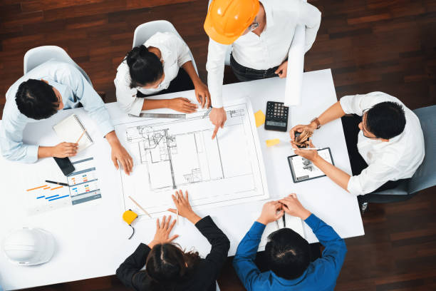 istock Diverse group of civil engineer and client working on architect. Prudent 2192778934