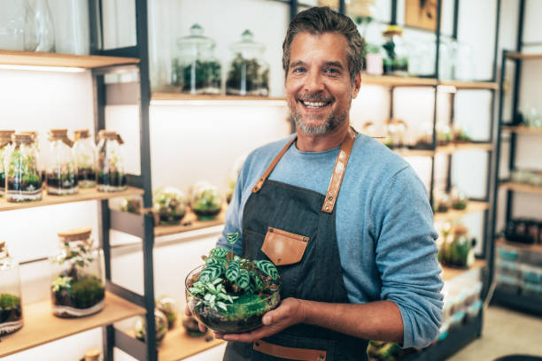 istock Cheerful flower shop owner 2192780208