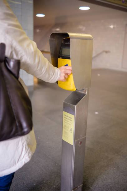 istock Woman passing ticket at subway entrance 2192781687