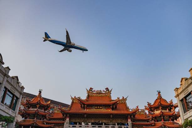 istock Airplane over Chinese temple 2192782257