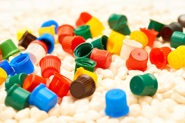 istock Multi colored caps lids.Ketchup, mayonnaise, mustard, sauces on white stones 2192782937