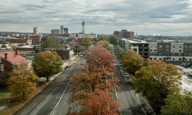 istock Aerial city view with autumn trees and cloudy sky. 2192783008