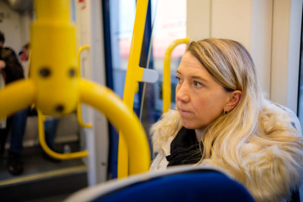 istock Woman sitting on the subway making the trip 2192783454