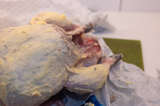 Organic turkey covered in butter ready to be cooked for Christmas dinner
