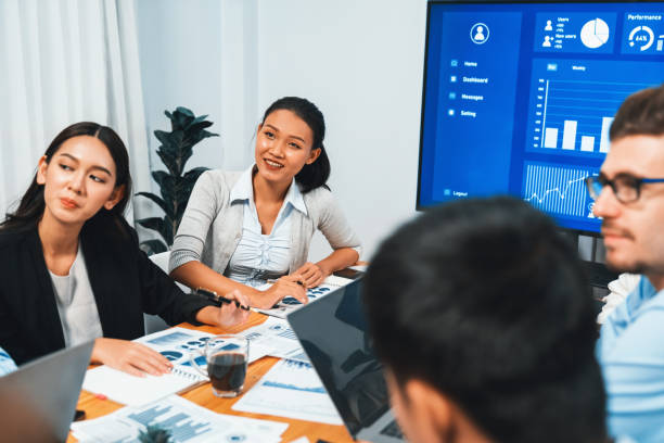 istock Group of business analyst team analyzing financial data report. Habiliment 2192784896