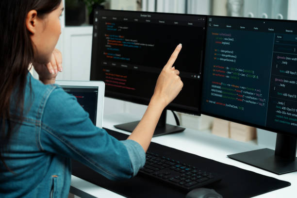 istock Young Asian in IT developer pointing online information on pc. Stratagem. 2192788162