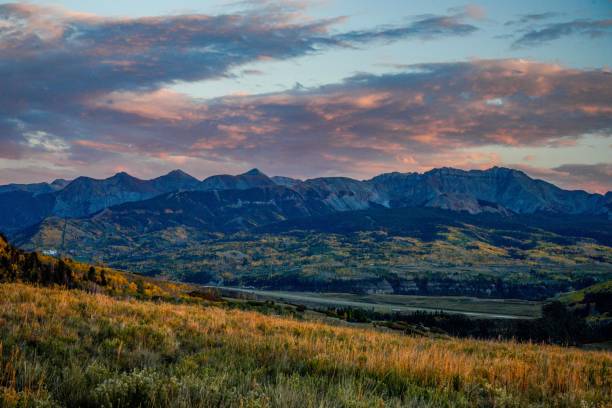 istock Scenic view of a mountain range under a colorful sunset sky. 2192788584