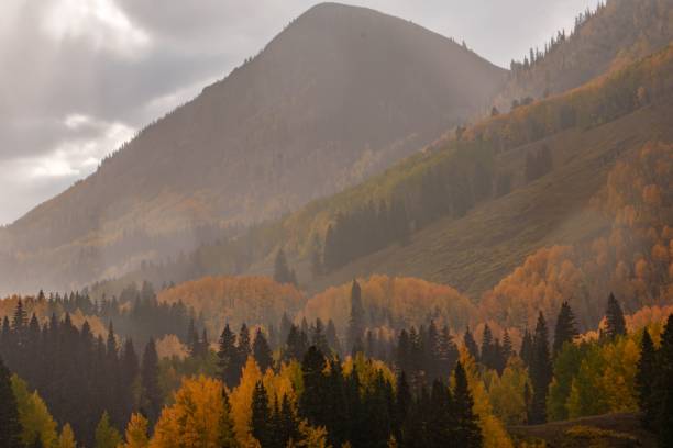 istock Autumn landscape featuring a mountain with colorful trees. 2192788634
