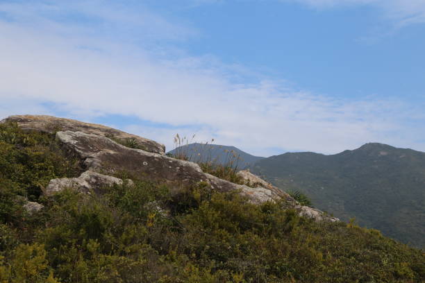istock A mountain range with a rocky hillside and a clear blue sky 2192791287