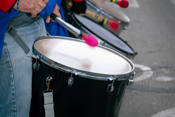 istock Street musician playing snare drum during parade 2192791379