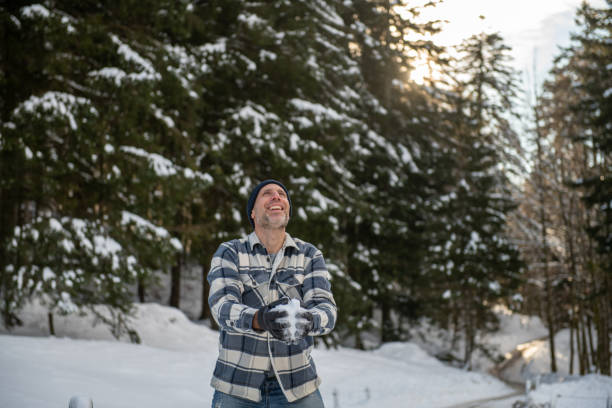 Man enjoying the snow in the forest