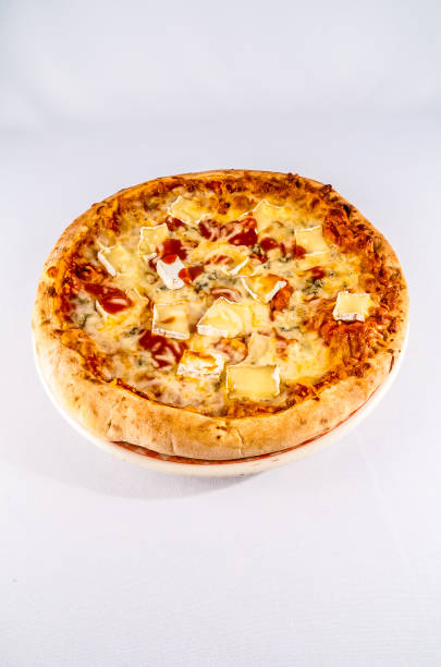 istock A pizza with cheese and tomato sauce sits on a white plate 2192794279