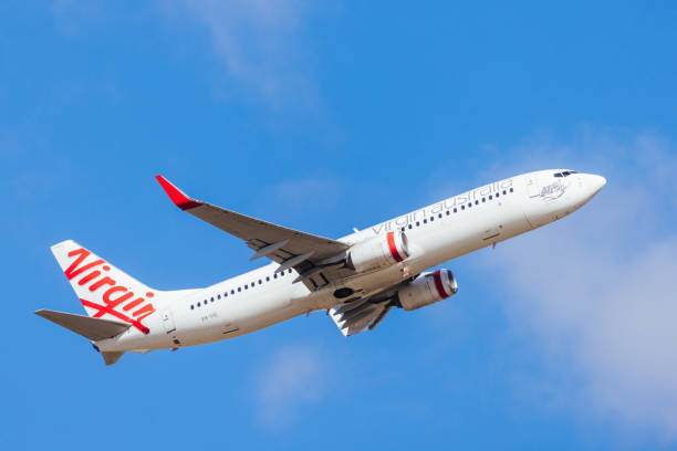 MELBOURNE, AUSTRALIA - SEPTEMBER 07, 2024: A Virgin Australia Boeing 737-8FE takes off from Melbourne on September 7th 2024