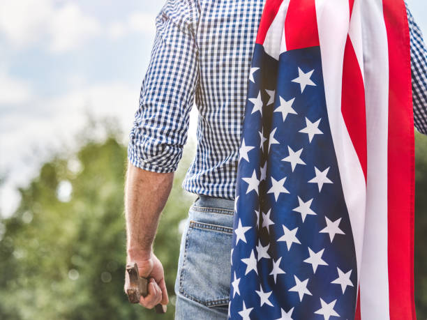 istock American Flag, attractive man in work clothes 2192800758