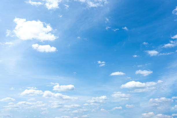 istock Serene Summer Sky Blue Sky with Fluffy White Cumulus Clouds Background 2192801644