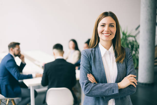 istock Friendly businesswoman in office setting 2192806808