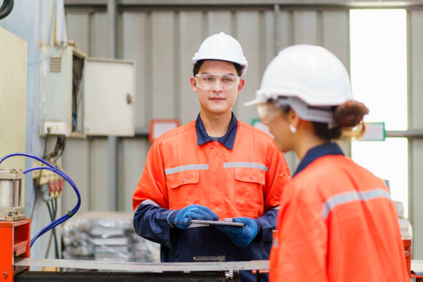 istock Team of engineers are perform the inspection on a machines. 2192808895