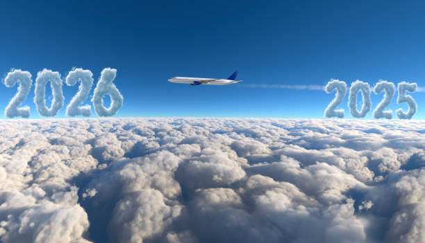 Commercial Plane Flying With 2026 And 2025 Writing On Clouds Stock Commercial Plane Flying With 2026 And 2025 Writing On Clouds 