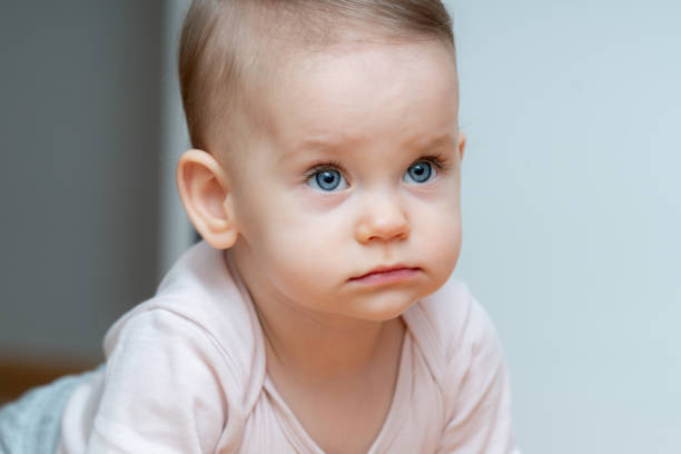 istock Attentive baby crawling with a focused gaze 2192810615