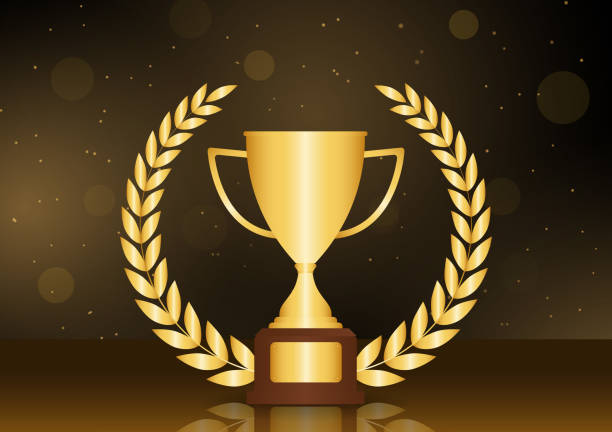 istock Golden Trophy Cup with Gold Laurel Wreath in Dark Background. Champion and Winning Concept. 2192812565
