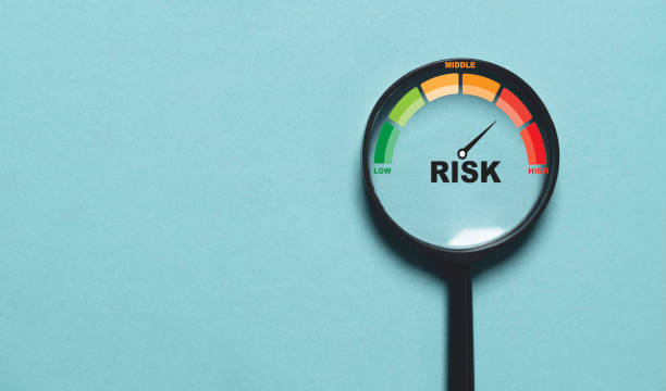 istock Risk level indicator rating since low to high inside of magnifier glass for Risk management and assessment con 2192813165