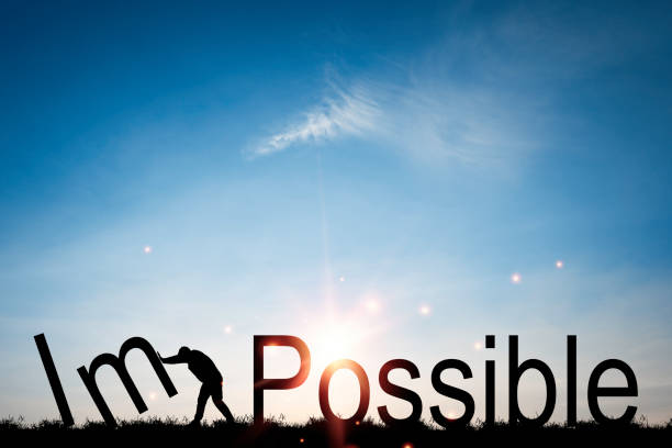 Silhouette businessman pushing alphabet for change impossible to possible , Positive thinking mindset concept.