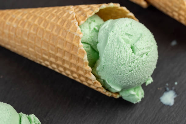 istock green ice cream with mint flavor on a black slate surface 2192813456