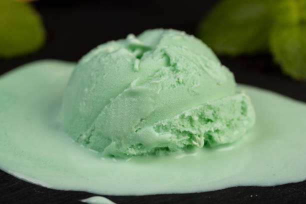 istock green ice cream with mint flavor on a black slate surface 2192813756