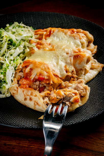 istock Stuffed pancake baked with cheese. 2192815363